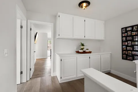 a hallway with cabinets