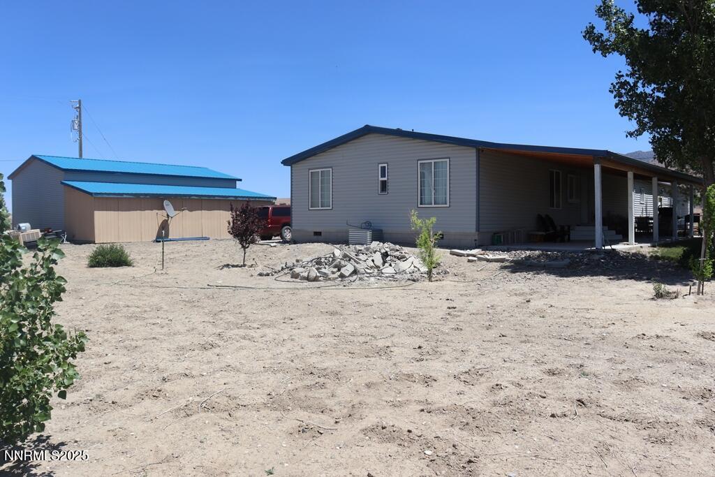 3400 Potbelly Road Winnemucca, NV 89445 - Photo 27 of 50 a view of a house with a yard