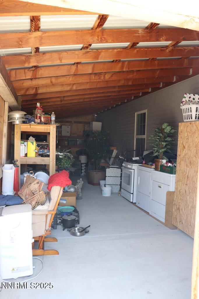 3400 Potbelly Road Winnemucca, NV 89445 - Photo 37 of 50 a view of a patio with table and chairs and potted plants