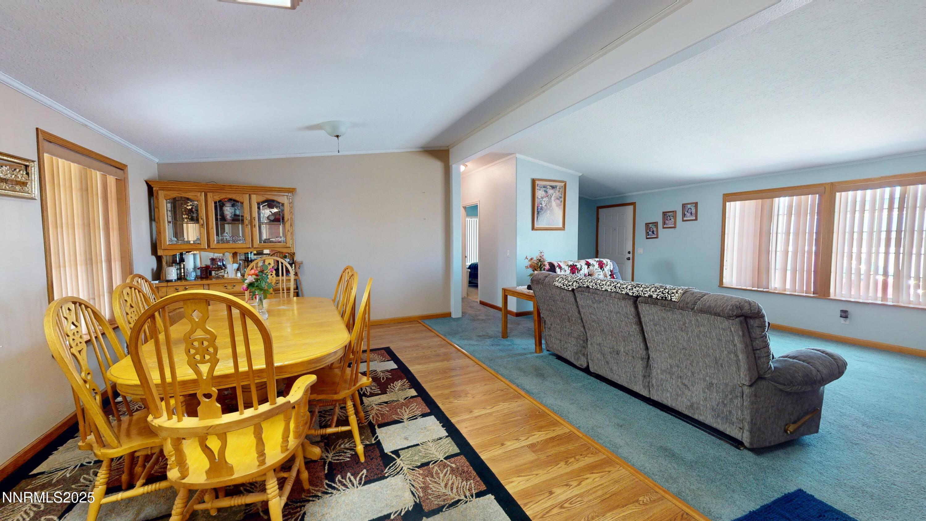 3400 Potbelly Road Winnemucca, NV 89445 - Photo 5 of 50 a living room with furniture and a flat screen tv