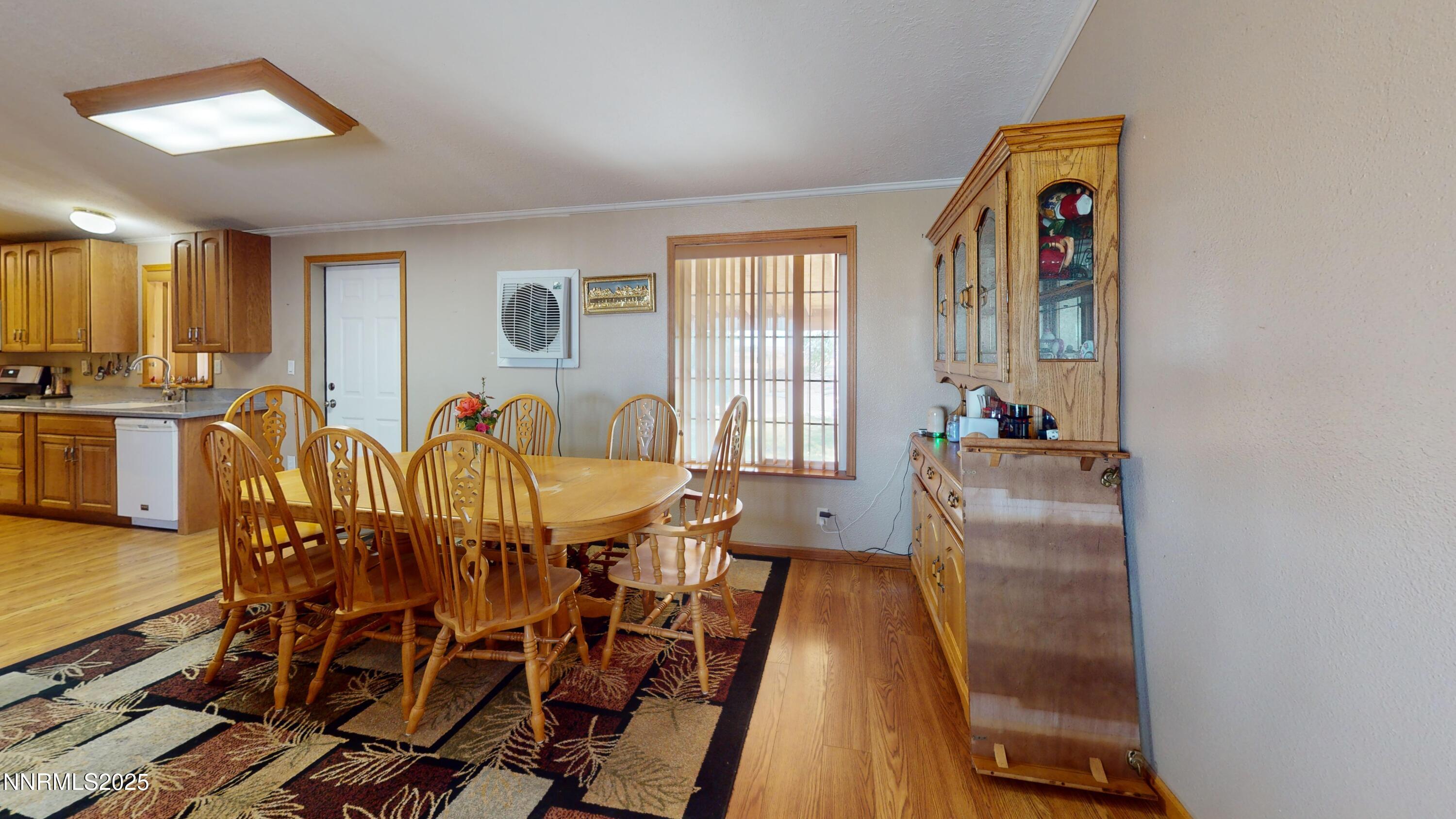3400 Potbelly Road Winnemucca, NV 89445 - Photo 6 of 50 a dining room with furniture and wooden floor