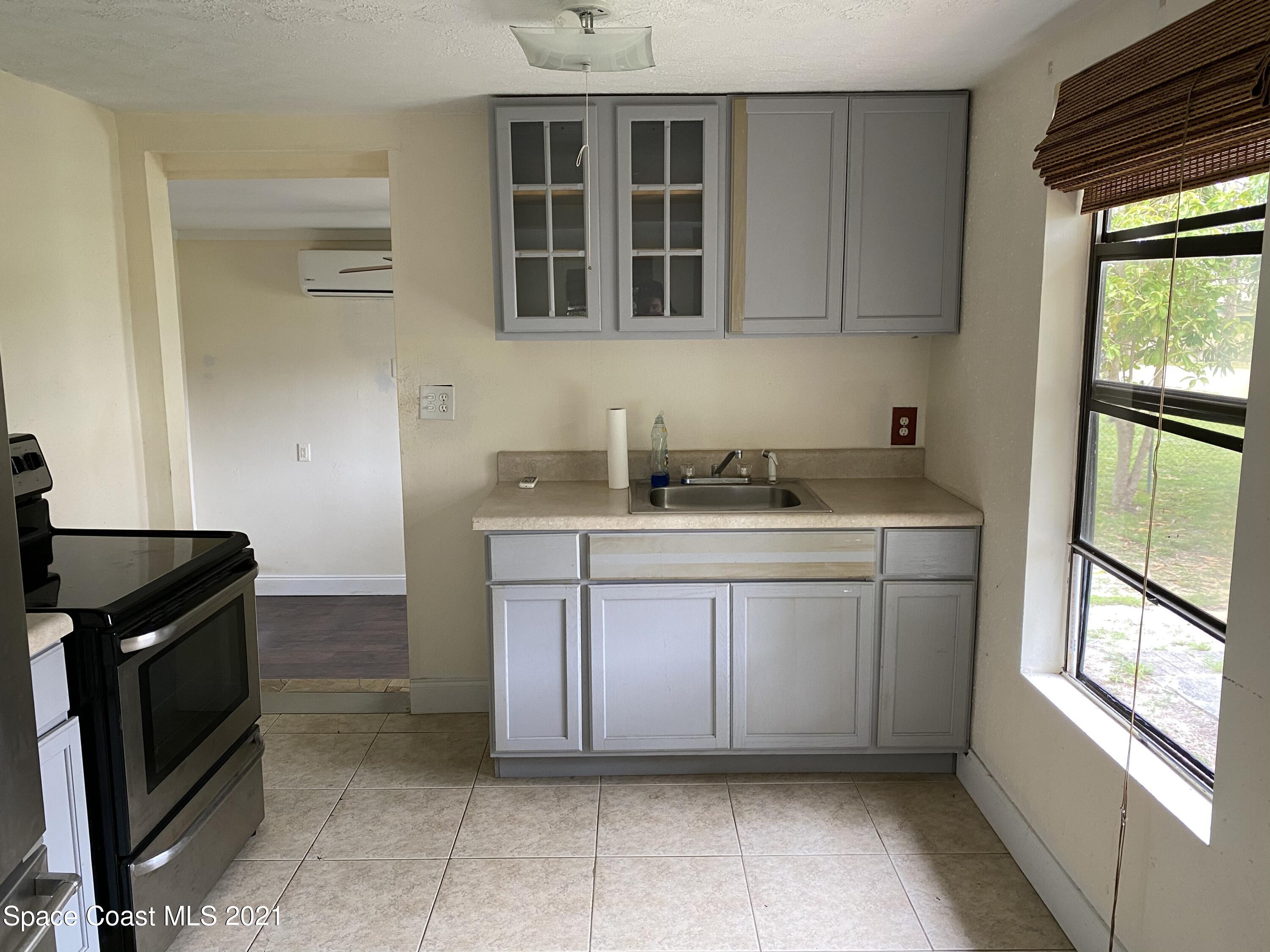 2526 2nd Avenue Northeast Palm Bay, FL 32905 - Photo 3 of 10 C69AF7A9-D14E-4F74-91CE-6E69514E1117