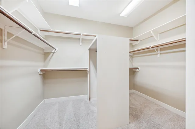 a view of an empty walk in closet