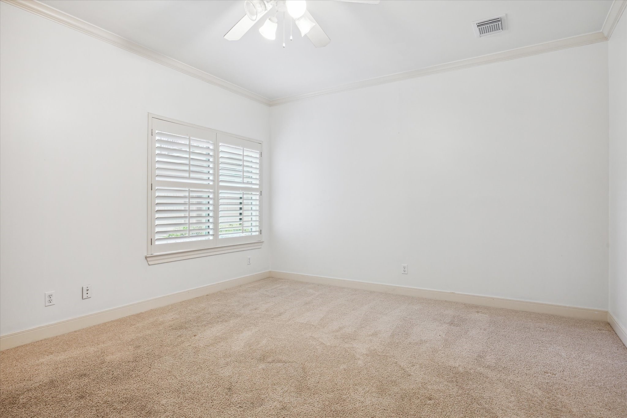 1826 Colquitt Street Houston, TX 77098 - Photo 16 of 23 an empty room with a window