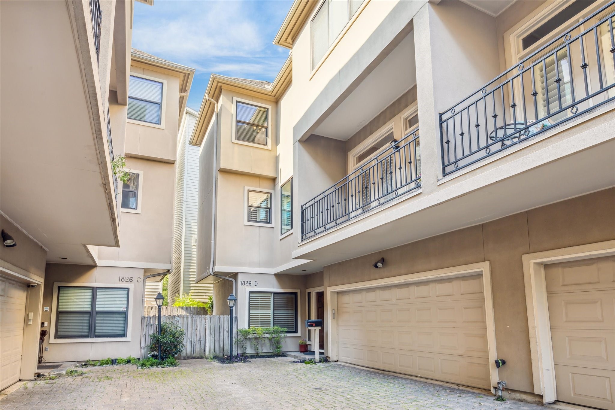 1826 Colquitt Street Houston, TX 77098 - Photo 2 of 23 a front view of a building with a garage