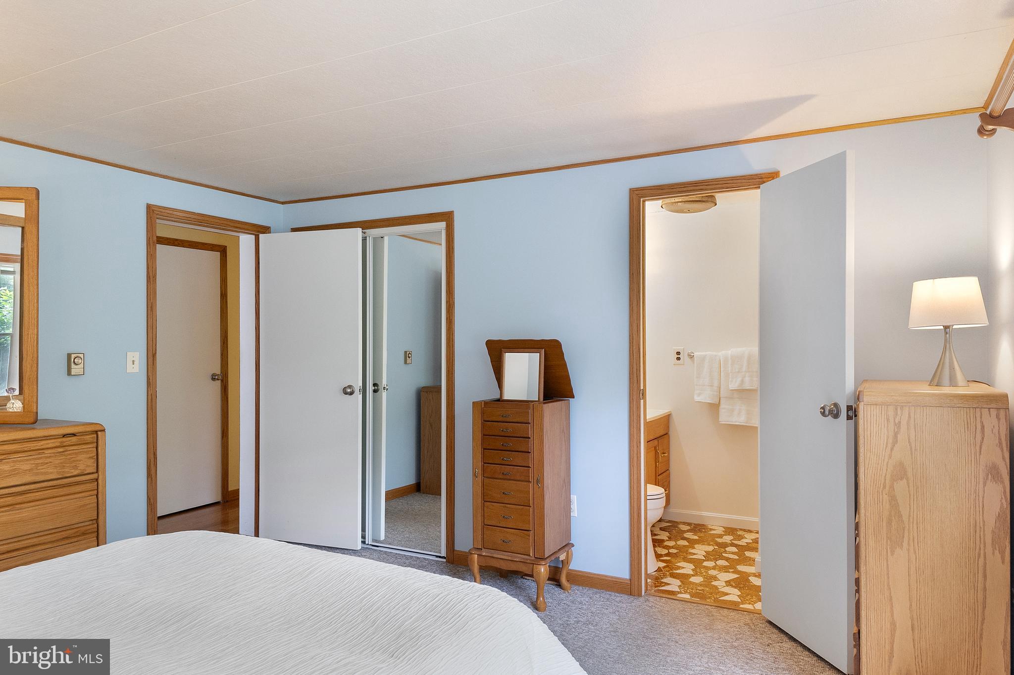 518 Laurel Road Riva, MD 21140 - Photo 12 of 42 a bedroom with a bed and a mirror