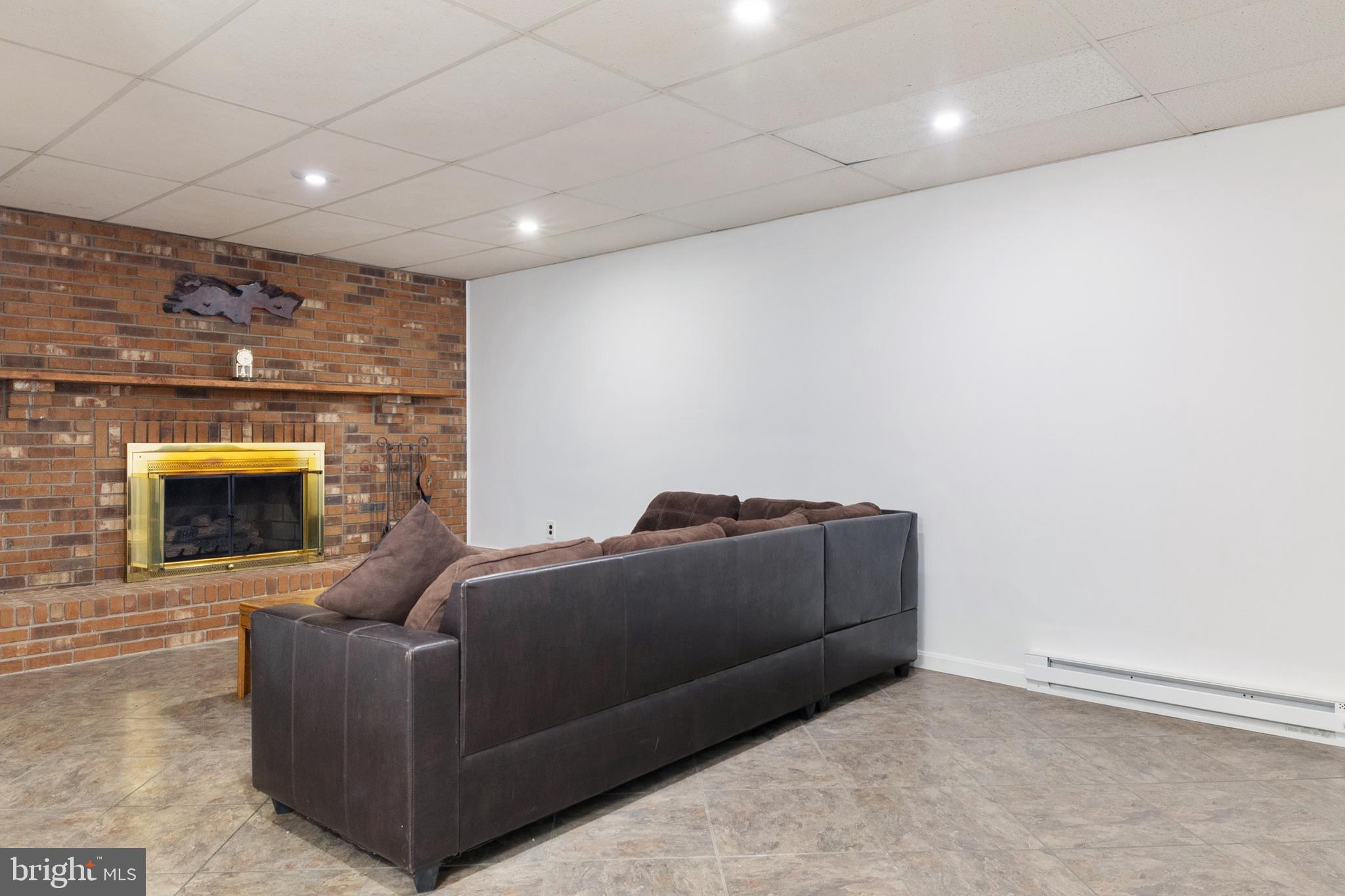 518 Laurel Road Riva, MD 21140 - Photo 18 of 42 a living room with furniture and a fireplace