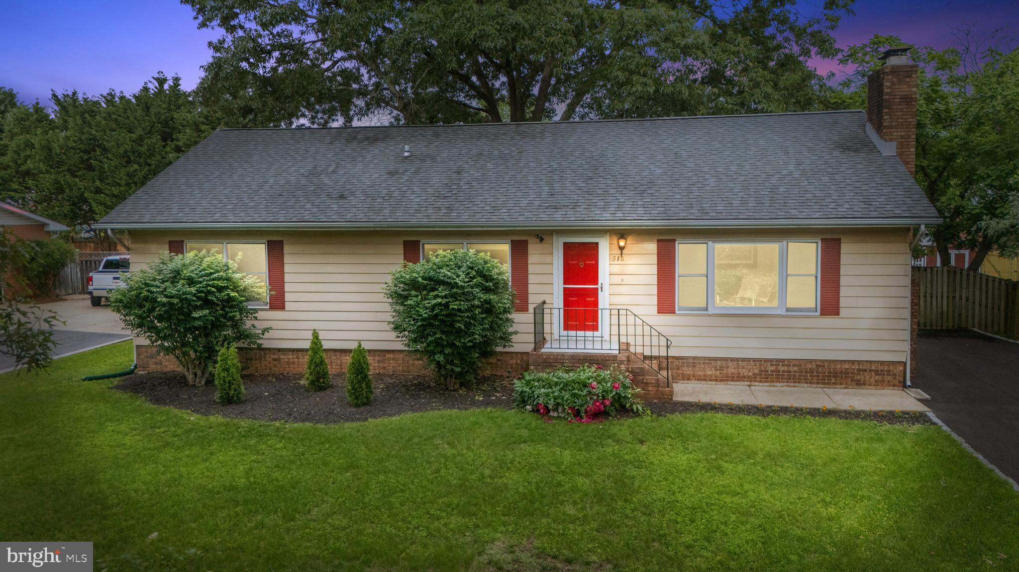 518 Laurel Road Riva, MD 21140 - Photo 2 of 42 a front view of a house with garden