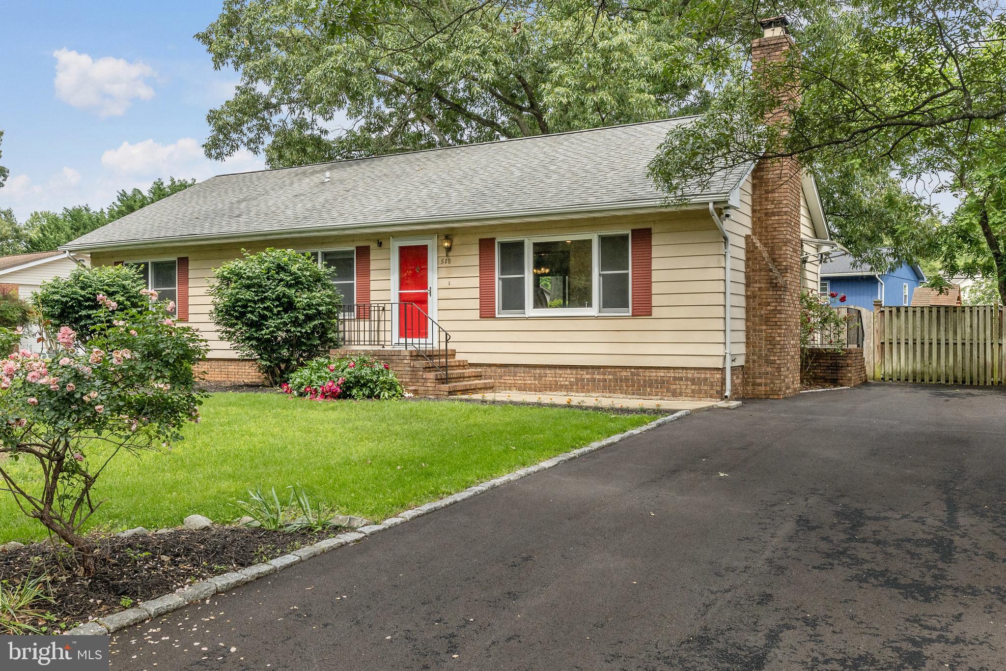 518 Laurel Road Riva, MD 21140 - Photo 3 of 42 a front view of a house with a yard and garage