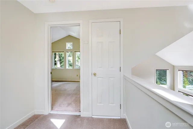 an empty room with windows