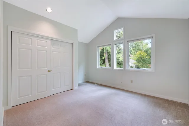 an empty room with a bathroom