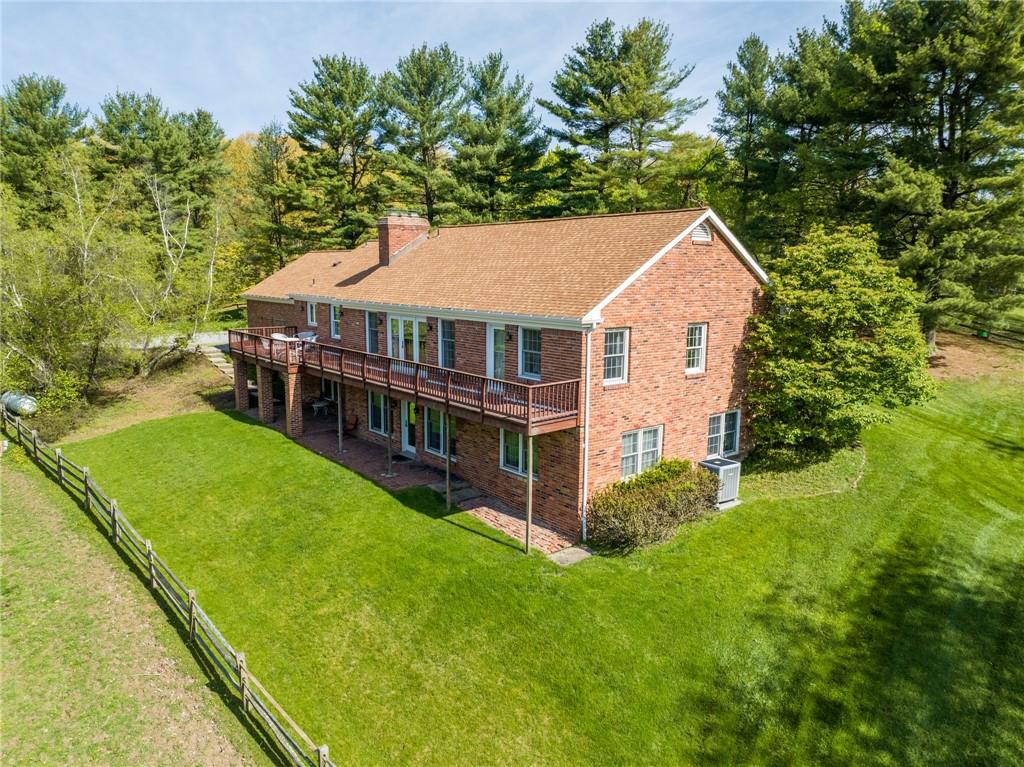 45 Stonedale Road Sewickley, PA 15143 - Photo 33 of 35 a aerial view of a house with swimming pool next to a yard