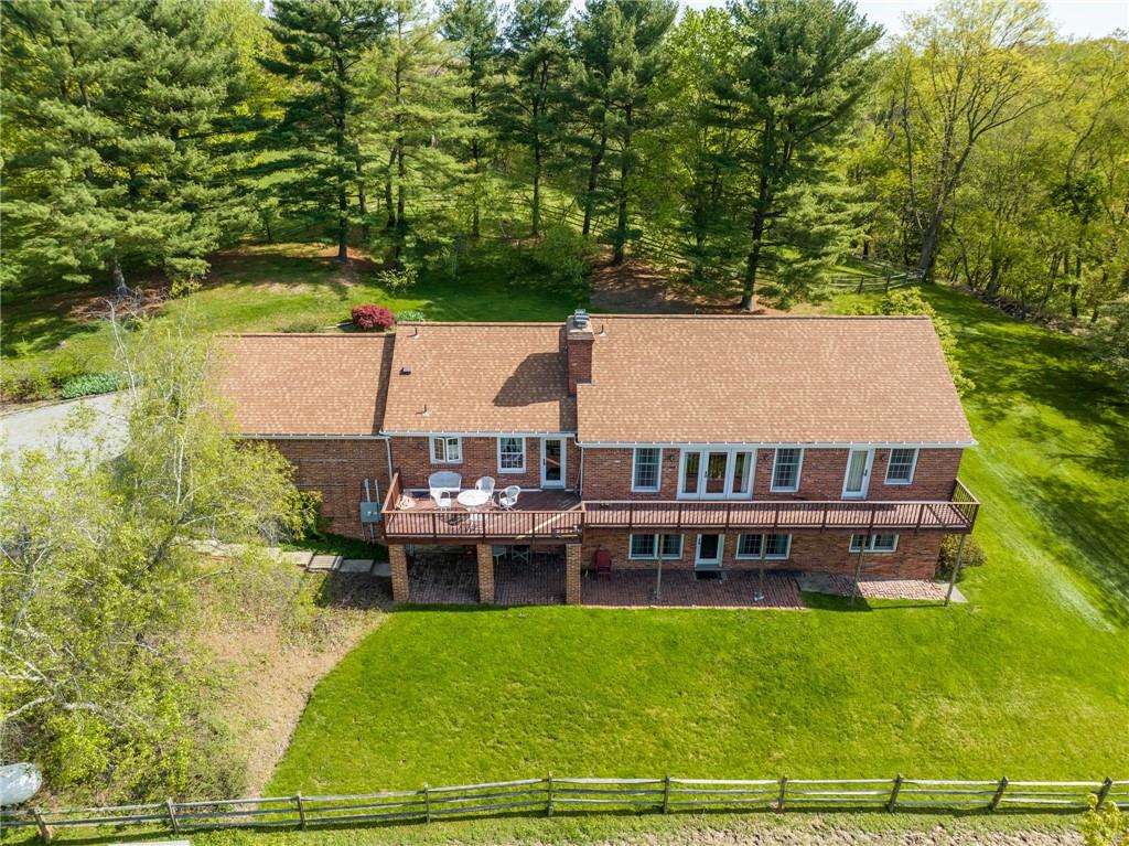 45 Stonedale Road Sewickley, PA 15143 - Photo 34 of 35 an aerial view of a house with swimming pool garden and patio