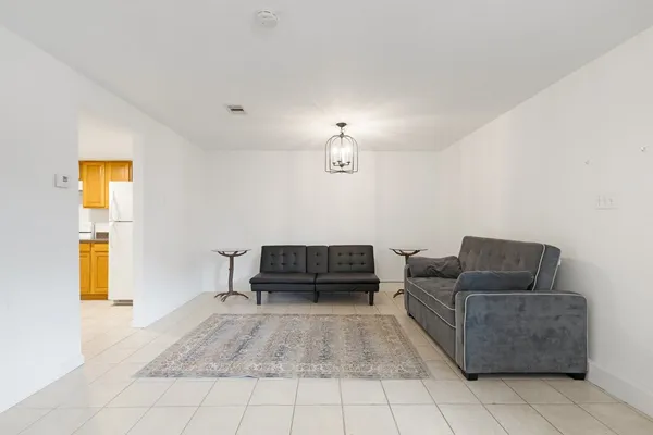 a living room with furniture and a couch