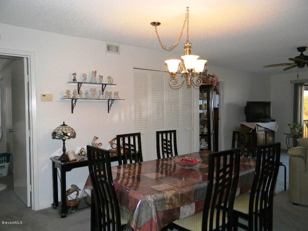 2727 North Wickham Road, Unit 2064 Melbourne, FL 32935 - Photo 2 of 13 Dining Room