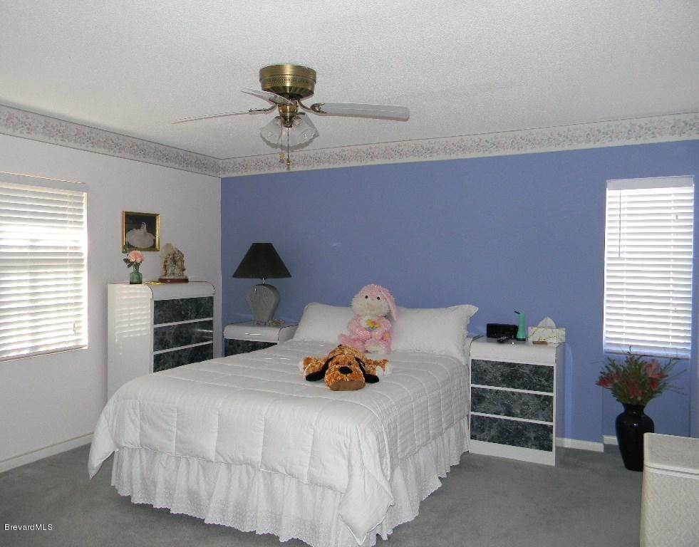 2727 North Wickham Road, Unit 2064 Melbourne, FL 32935 - Photo 4 of 13 Master Bedroom