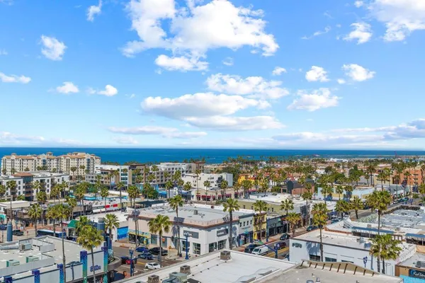 a view of city with ocean