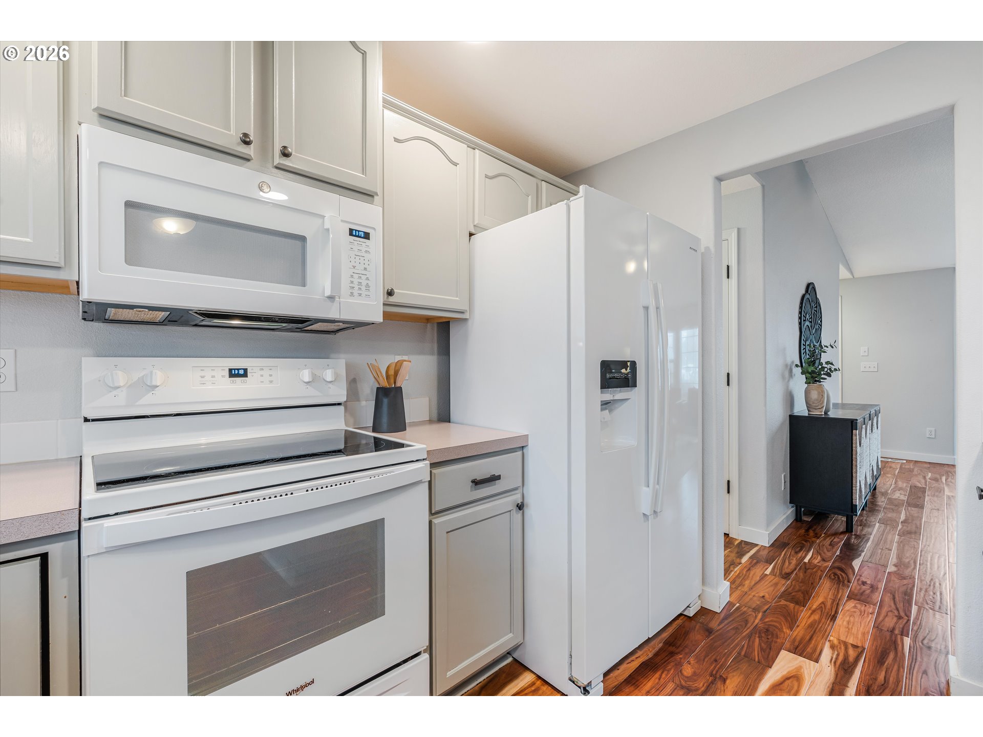 1615 Lilly Court Newberg, OR 97132 - Photo 13 of 30 a kitchen with stainless steel appliances a stove microwave and refrigerator