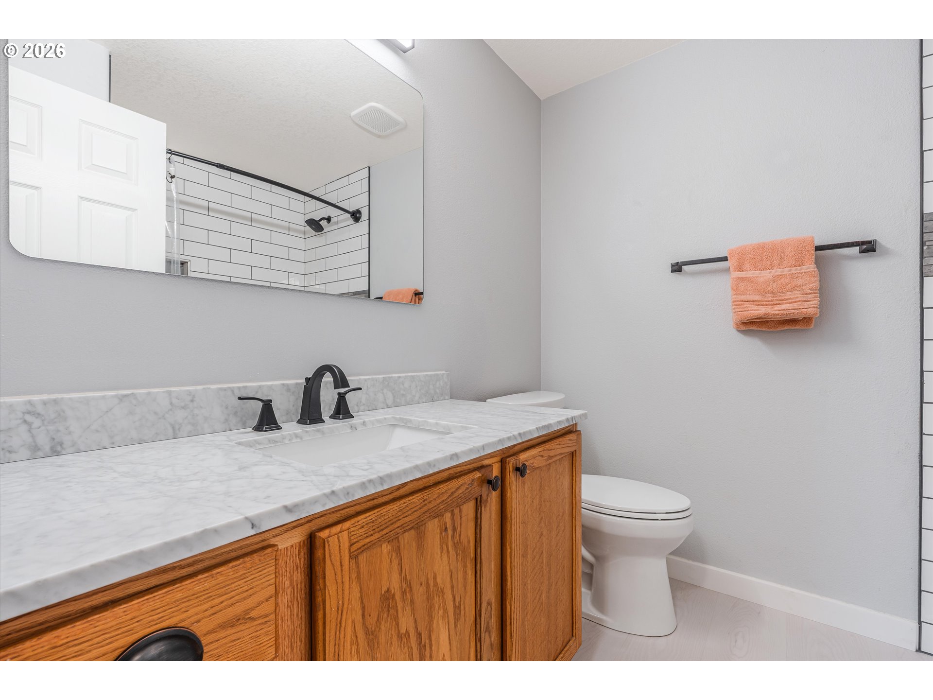 1615 Lilly Court Newberg, OR 97132 - Photo 23 of 30 a bathroom with a sink a toilet and mirror