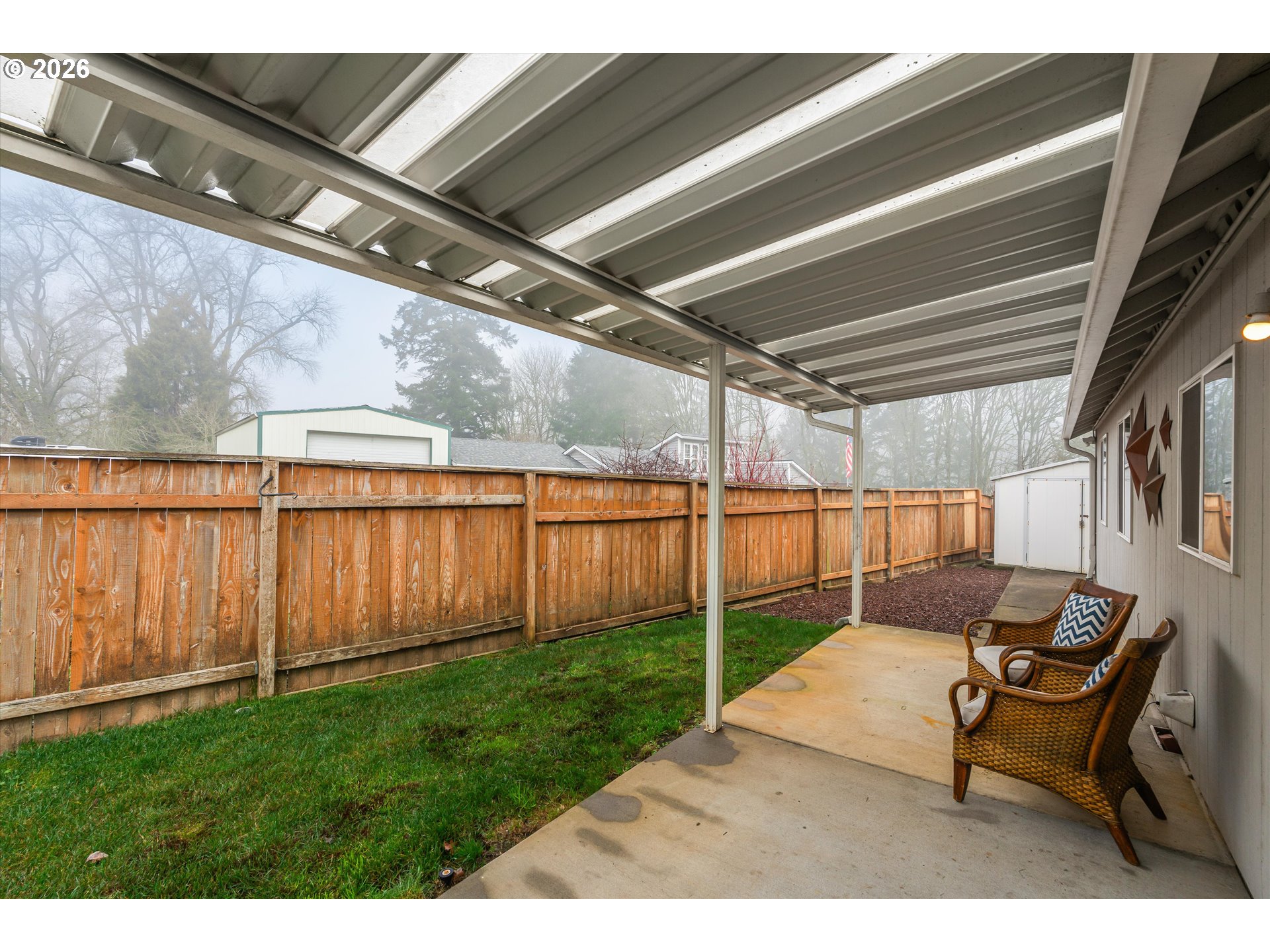 1615 Lilly Court Newberg, OR 97132 - Photo 26 of 30 a backyard of a house with table and chairs