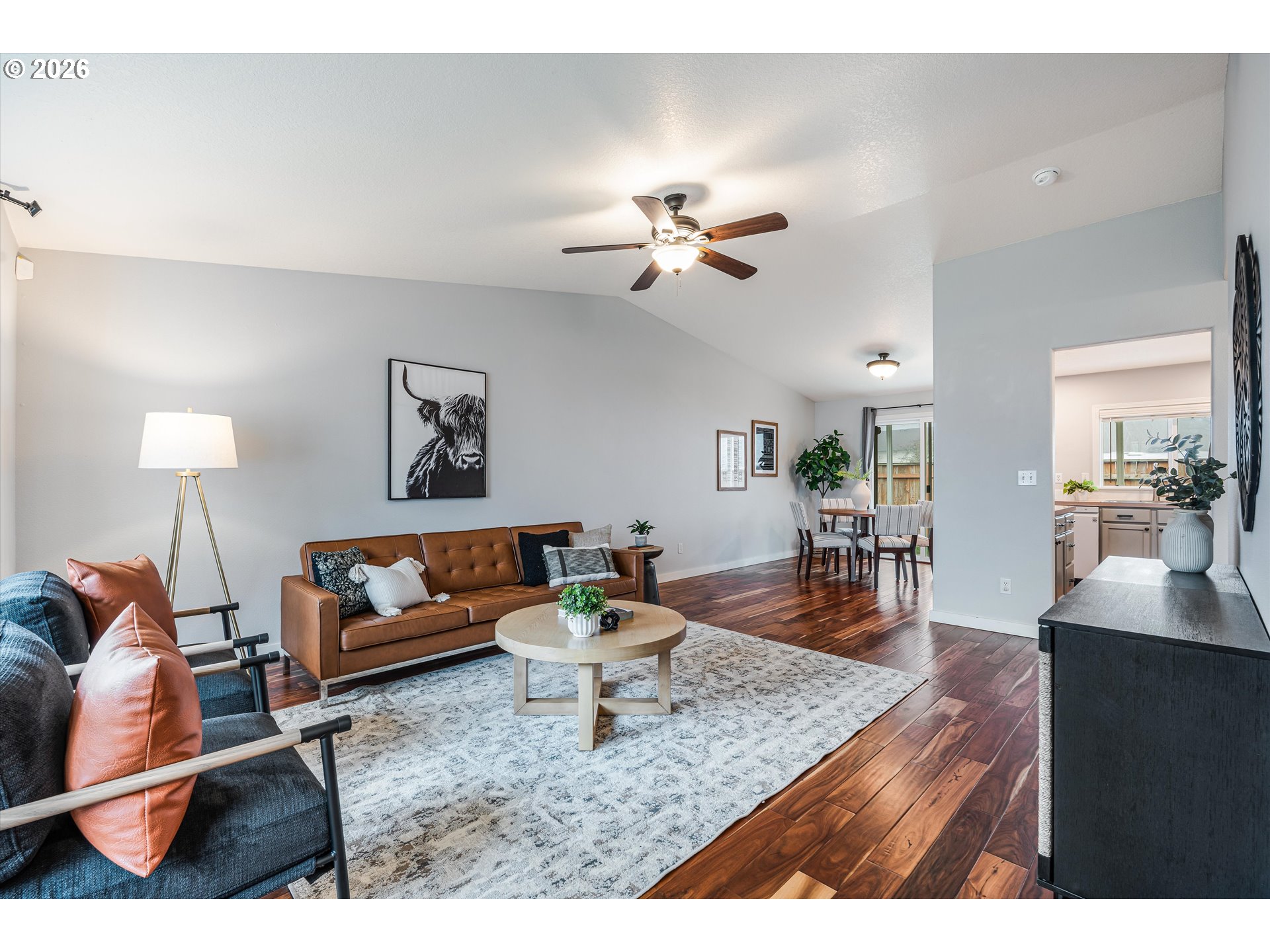 1615 Lilly Court Newberg, OR 97132 - Photo 3 of 30 a living room with furniture and a wooden floor
