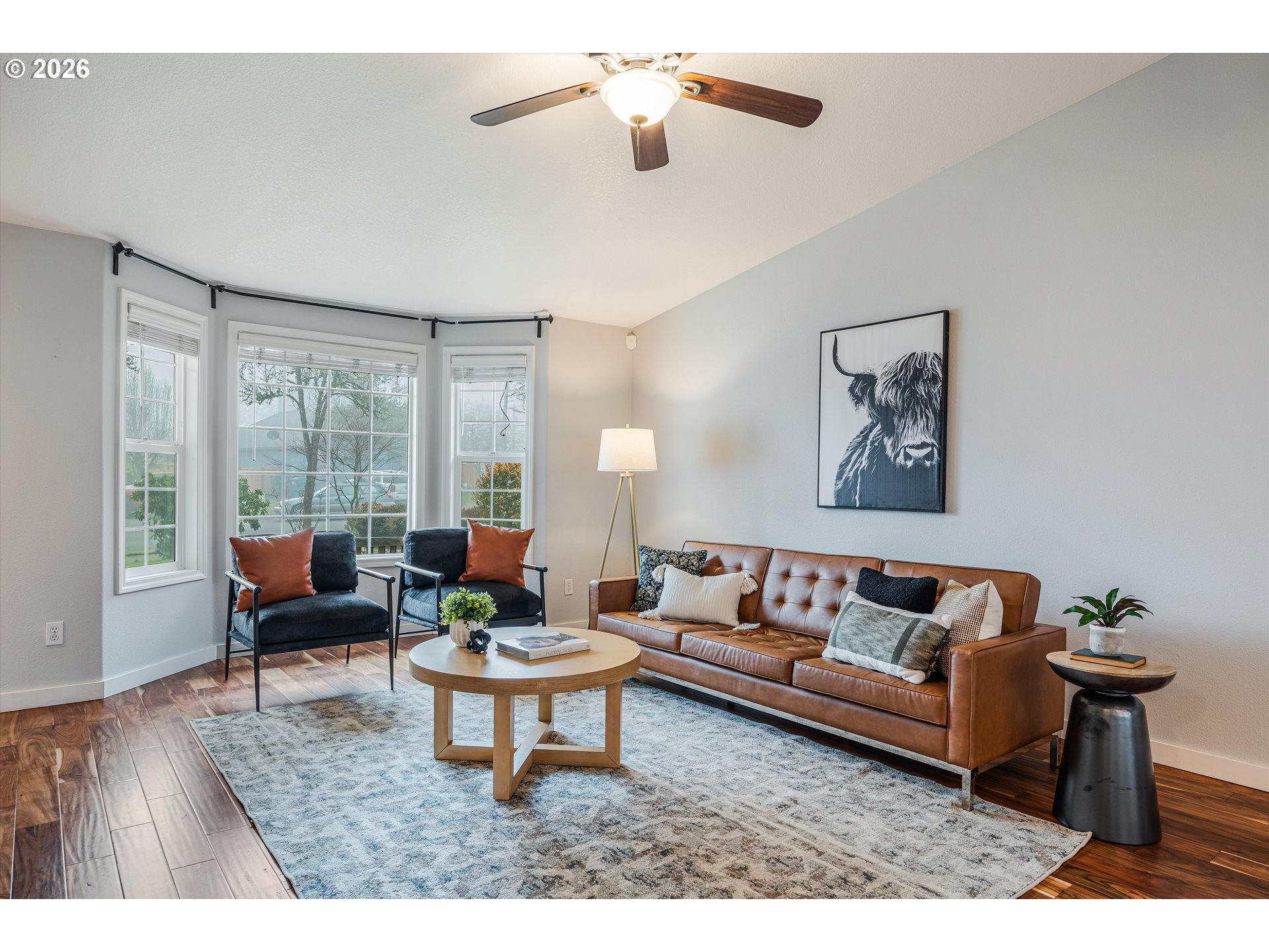 1615 Lilly Court Newberg, OR 97132 - Photo 5 of 30 a living room with furniture and a large window
