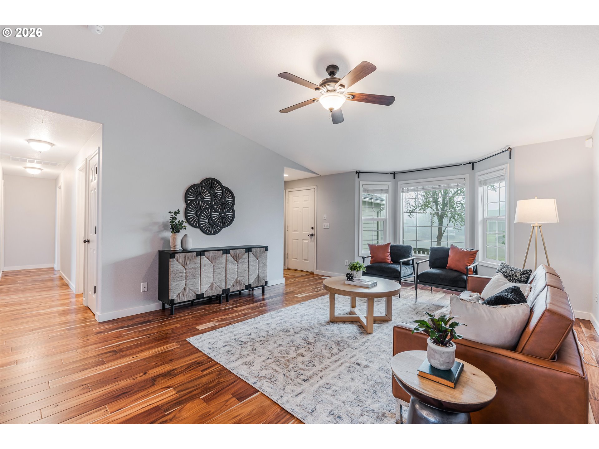 1615 Lilly Court Newberg, OR 97132 - Photo 6 of 30 a living room with furniture and a wooden floor