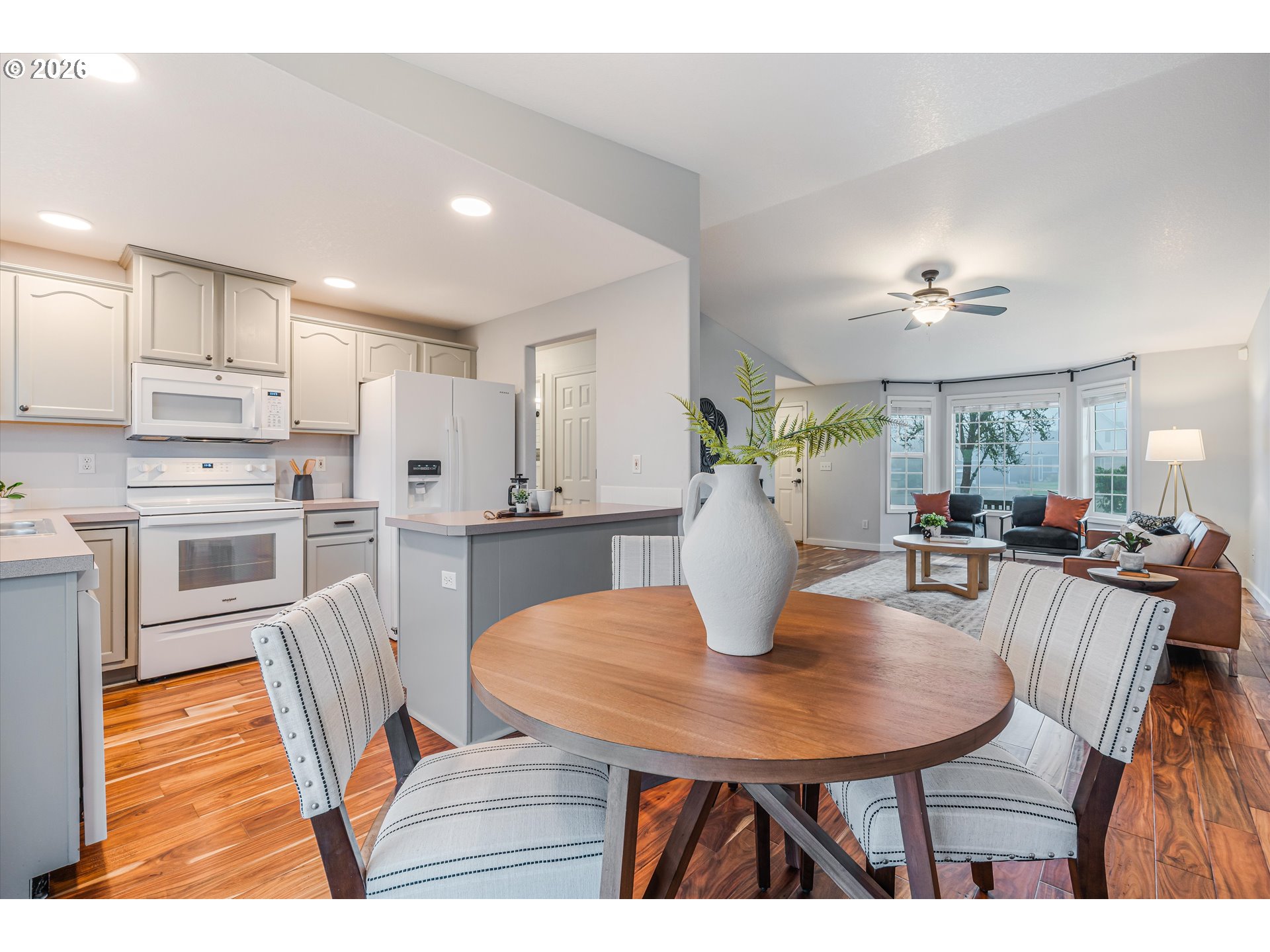 1615 Lilly Court Newberg, OR 97132 - Photo 9 of 30 a view of kitchen with cabinets table and chairs