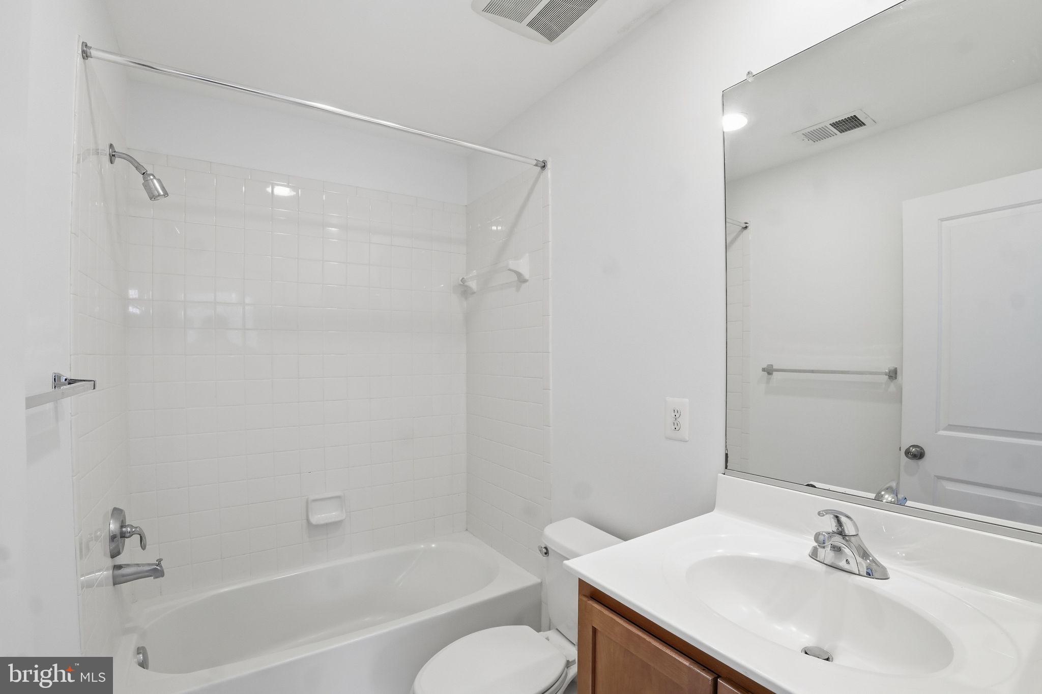 5610 Lustine Street Hyattsville, MD 20781 - Photo 18 of 36 Bright and airy bathroom retreat.