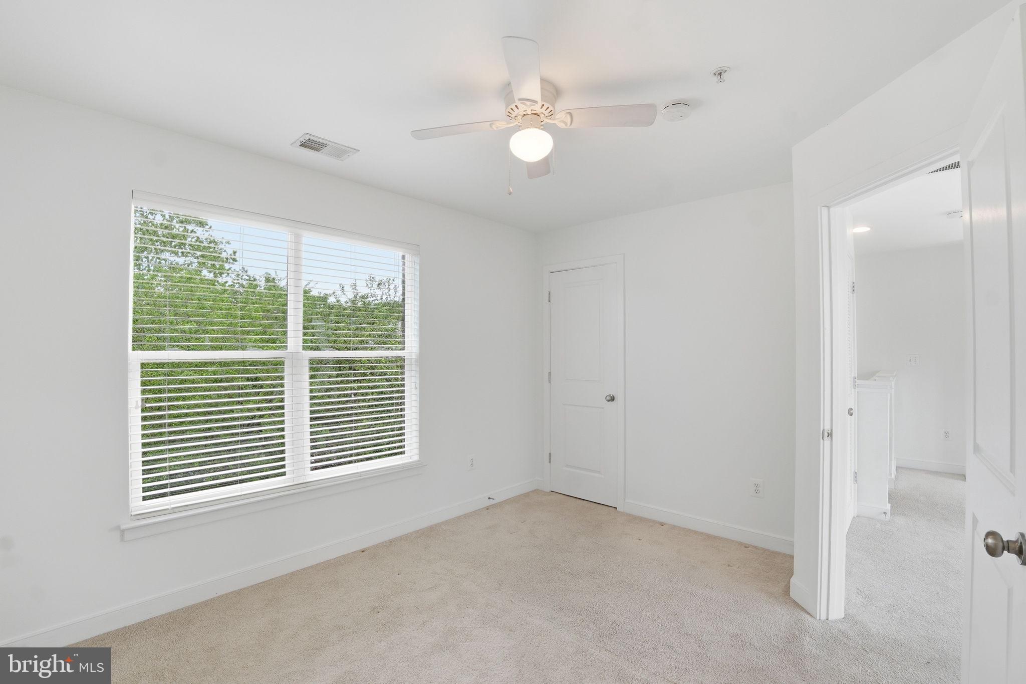 5610 Lustine Street Hyattsville, MD 20781 - Photo 23 of 36 Bright and airy bedroom retreat.