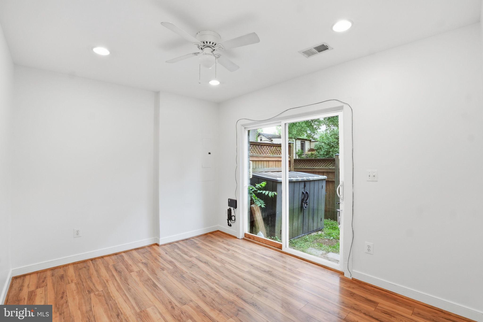 5610 Lustine Street Hyattsville, MD 20781 - Photo 27 of 36 Bright and airy space with outdoor access.