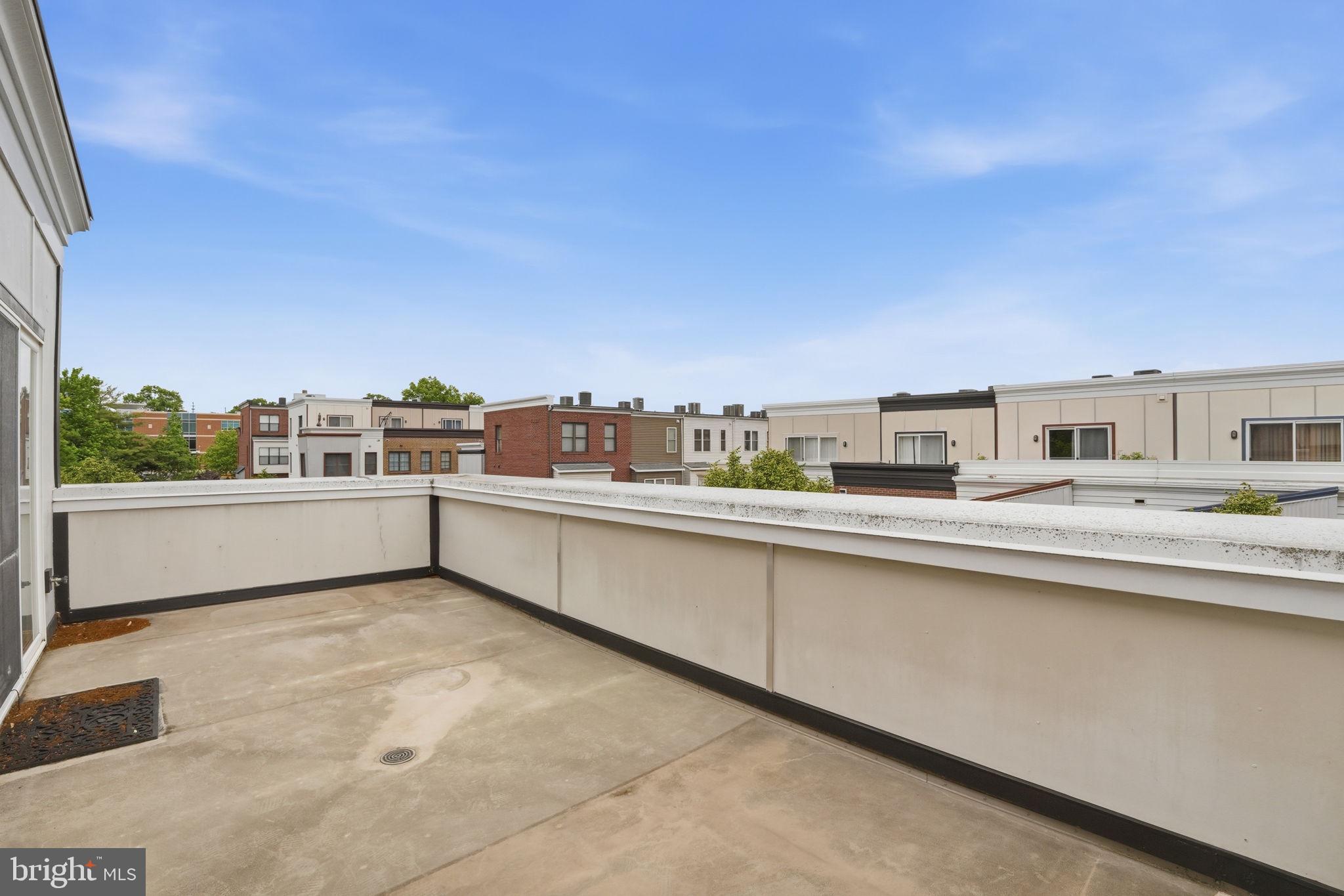5610 Lustine Street Hyattsville, MD 20781 - Photo 30 of 36 Spacious rooftop retreat with skyline views.