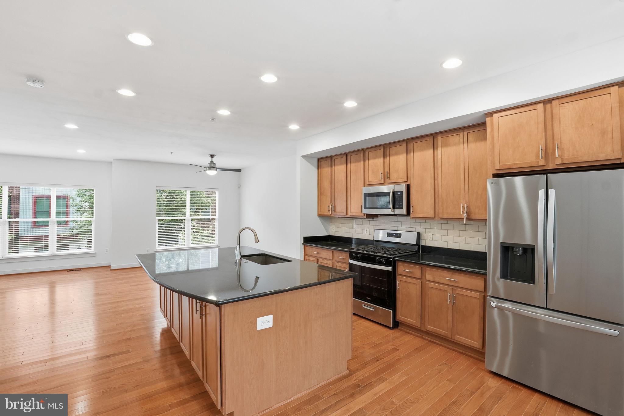 5610 Lustine Street Hyattsville, MD 20781 - Photo 5 of 36 Modern kitchen with sleek finishes.