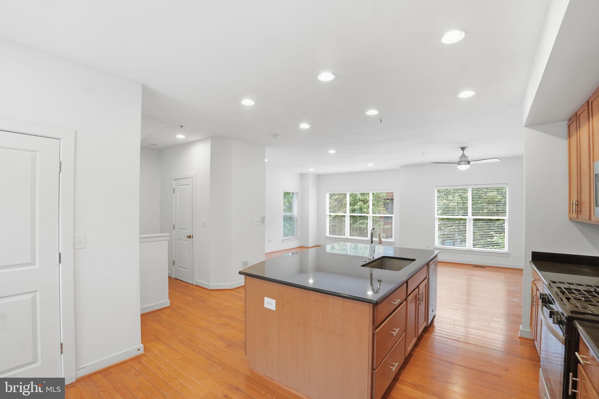 5610 Lustine Street Hyattsville, MD 20781 - Photo 6 of 36 Bright and airy open-concept kitchen.