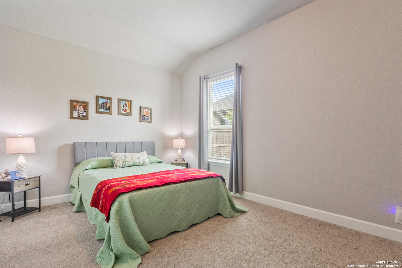 28502 Colares Way San Antonio, TX 78260 - Photo 32 of 38 a bedroom with a bed and a window