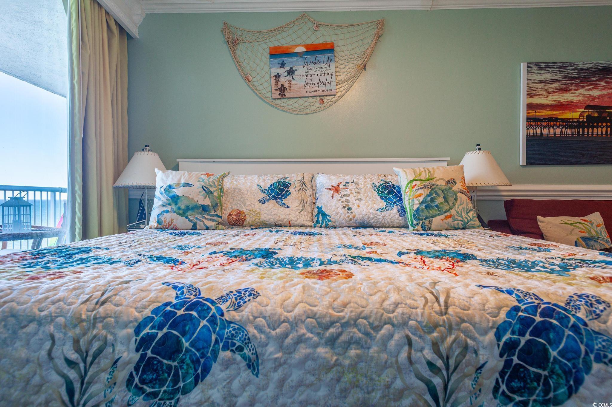 9550 Shore Drive, Unit 1728 Myrtle Beach, SC 29572 - Photo 18 of 36 Bedroom with ornamental molding