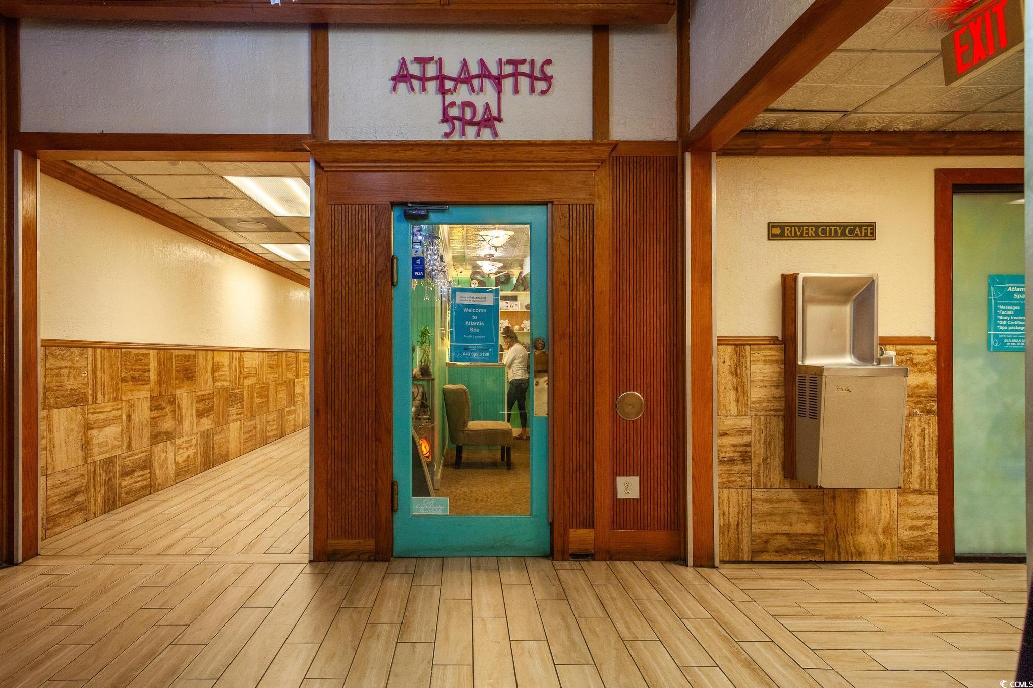 9550 Shore Drive, Unit 1728 Myrtle Beach, SC 29572 - Photo 32 of 36 Dining room featuring concrete floors and an ornate ceiling