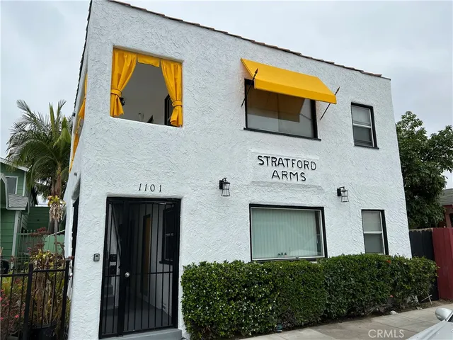 a front view of a house with a garage