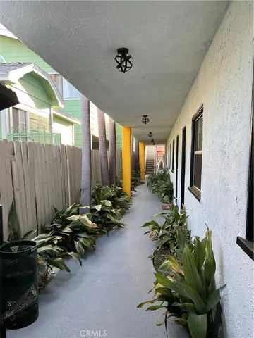 a view of a entryway with flower pots
