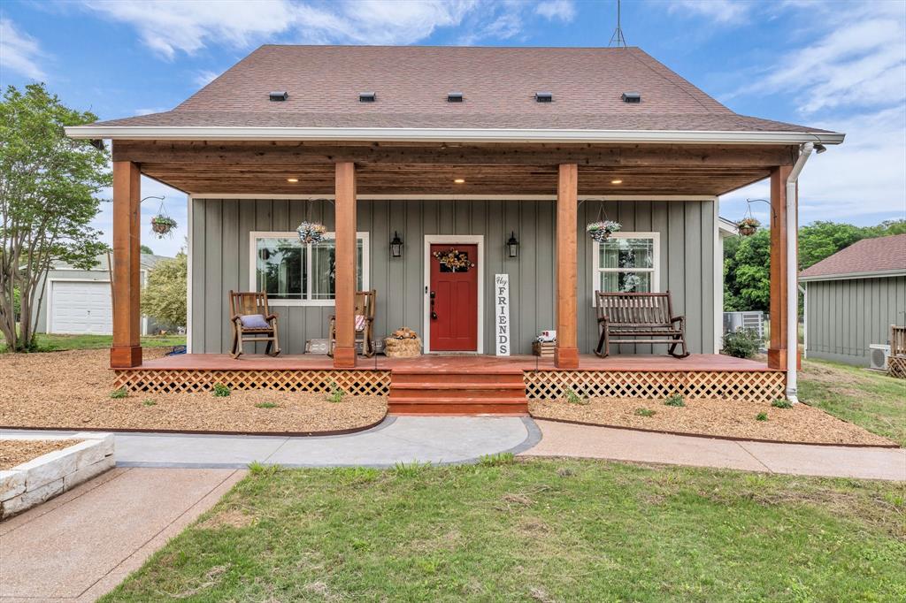 a front view of a house with a glass door