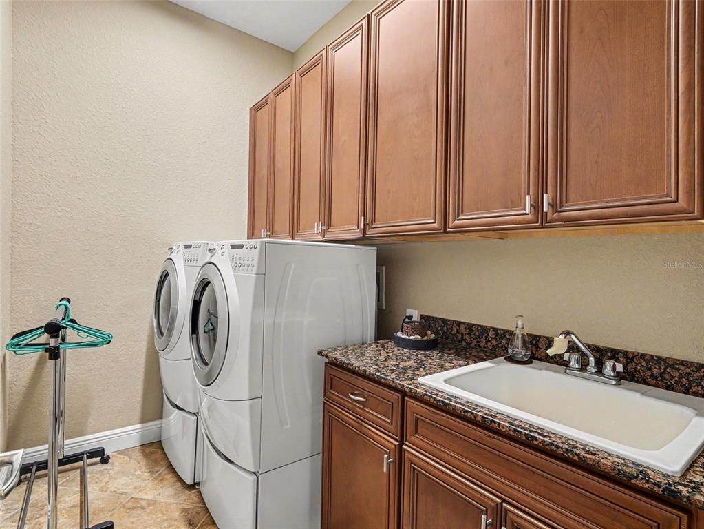 339 Corbett Road Lithia, FL 33547 - Photo 30 of 38 a utility room with dryer and washer