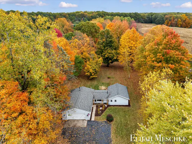 $379,900 | 5760 Sunfish Lake Avenue Northeast, Rockford, MI 49341