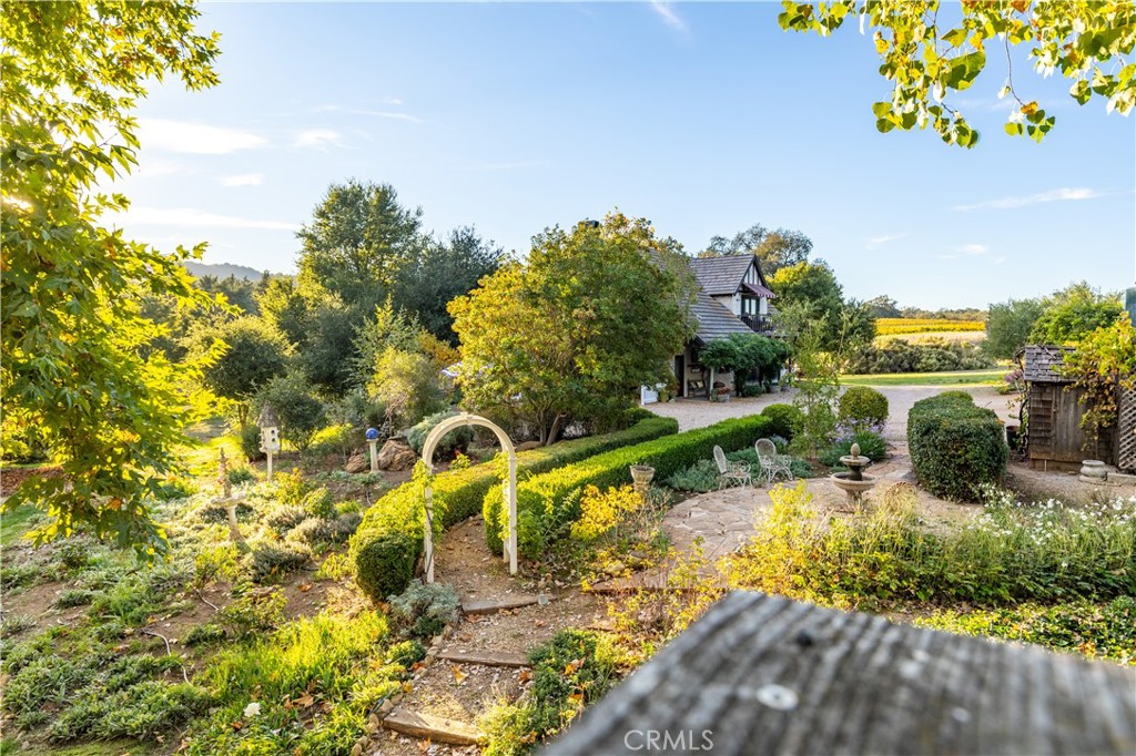 5415 Fairhills Road Paso Robles, CA 93446 - Photo 47 of 73 Well established landscape surrounds walkways between the main residence and the carriage house.