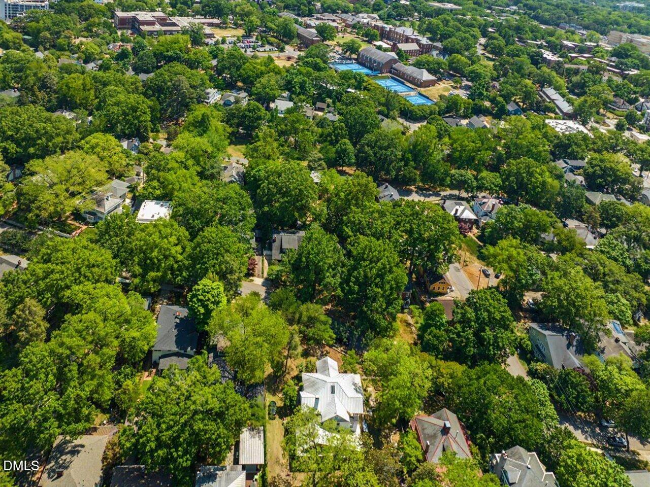 215 Hillcrest Road Raleigh, NC 27605 - Photo 95 of 97 an aerial view of residential houses with outdoor space and trees
