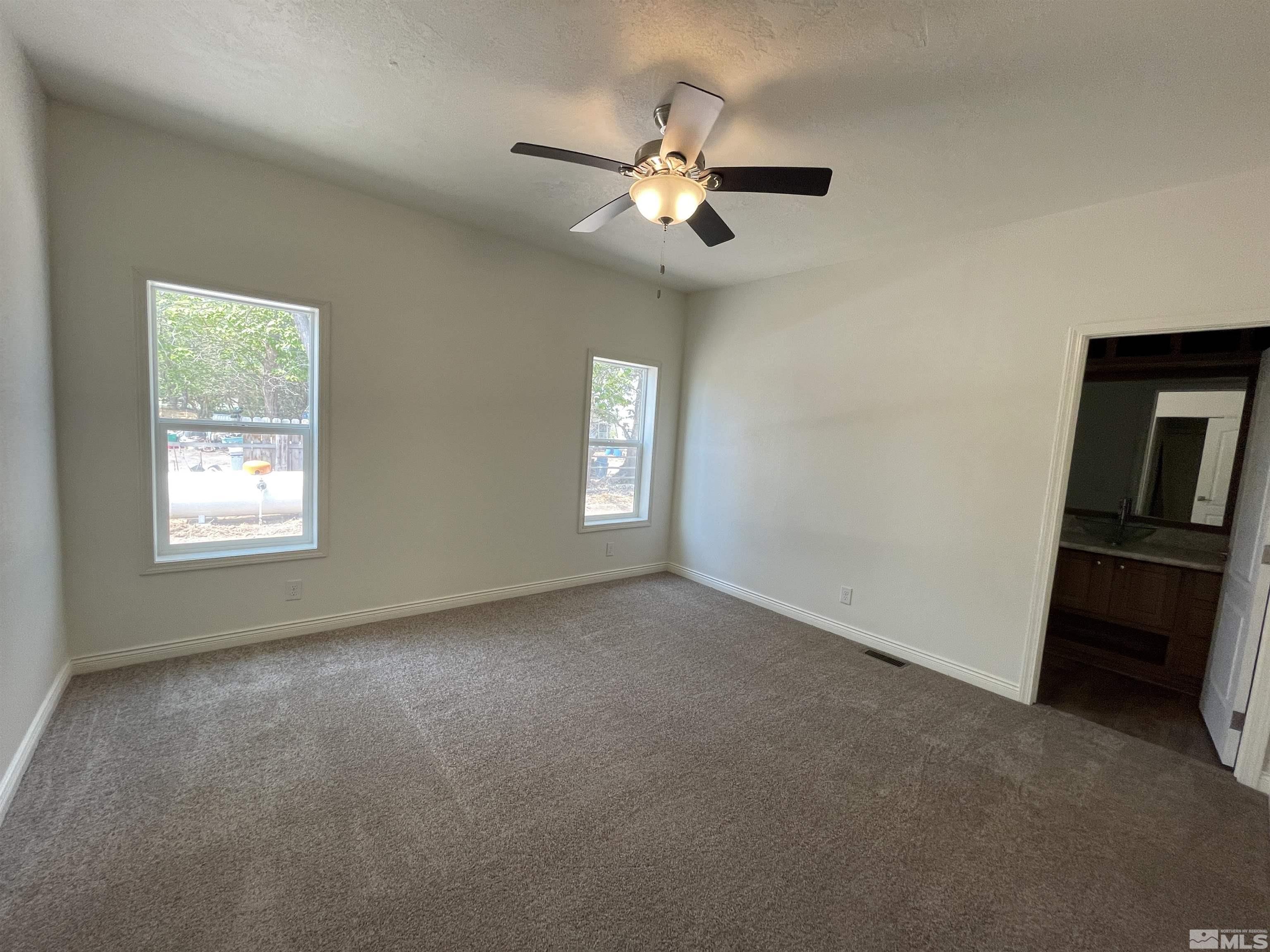 3660 Bottom Road Fallon, NV 89406 - Photo 8 of 13 a view of an empty room with a window