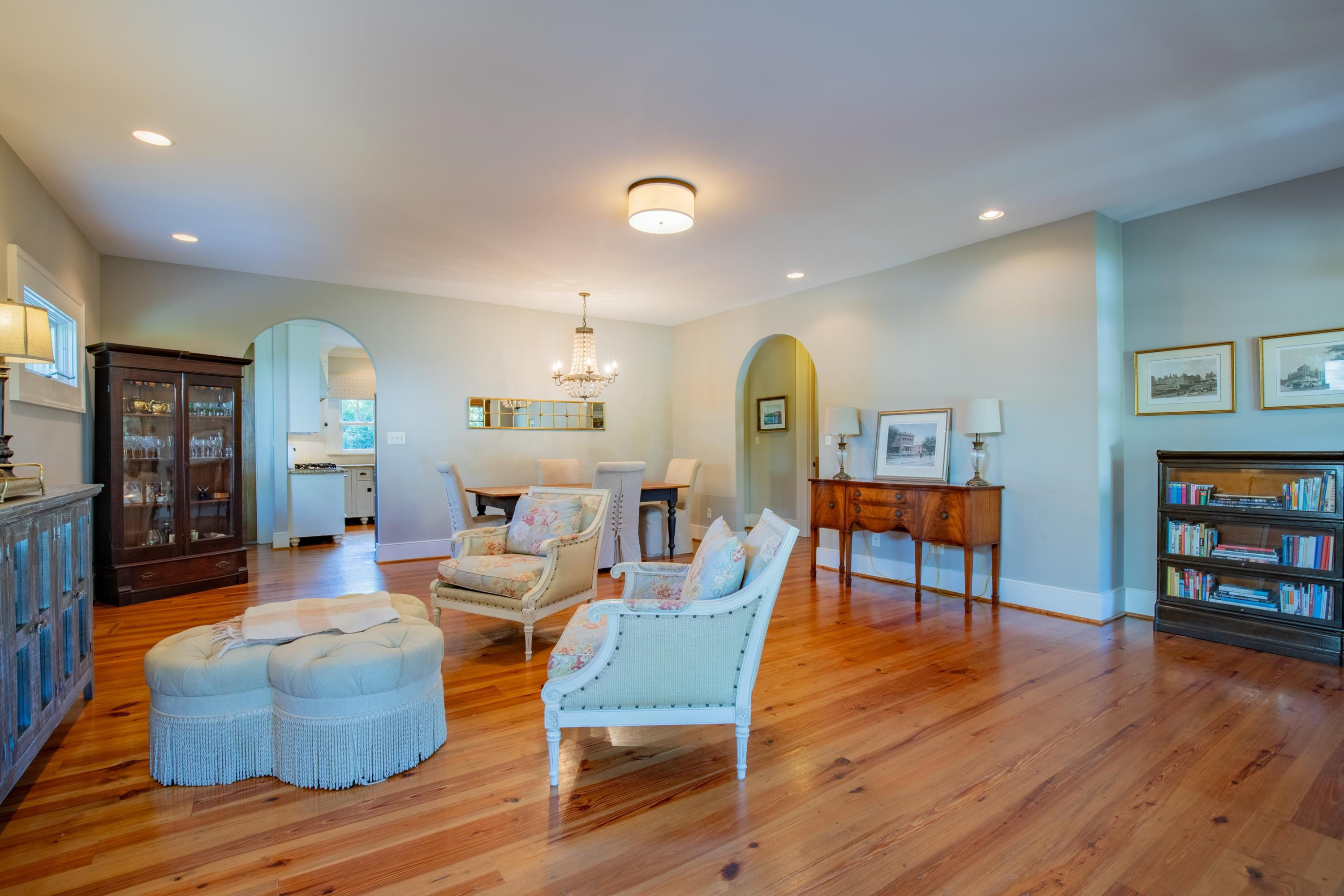 616 Mills Street Raleigh, NC 27608 - Photo 4 of 30 a living room with furniture and a wooden floor