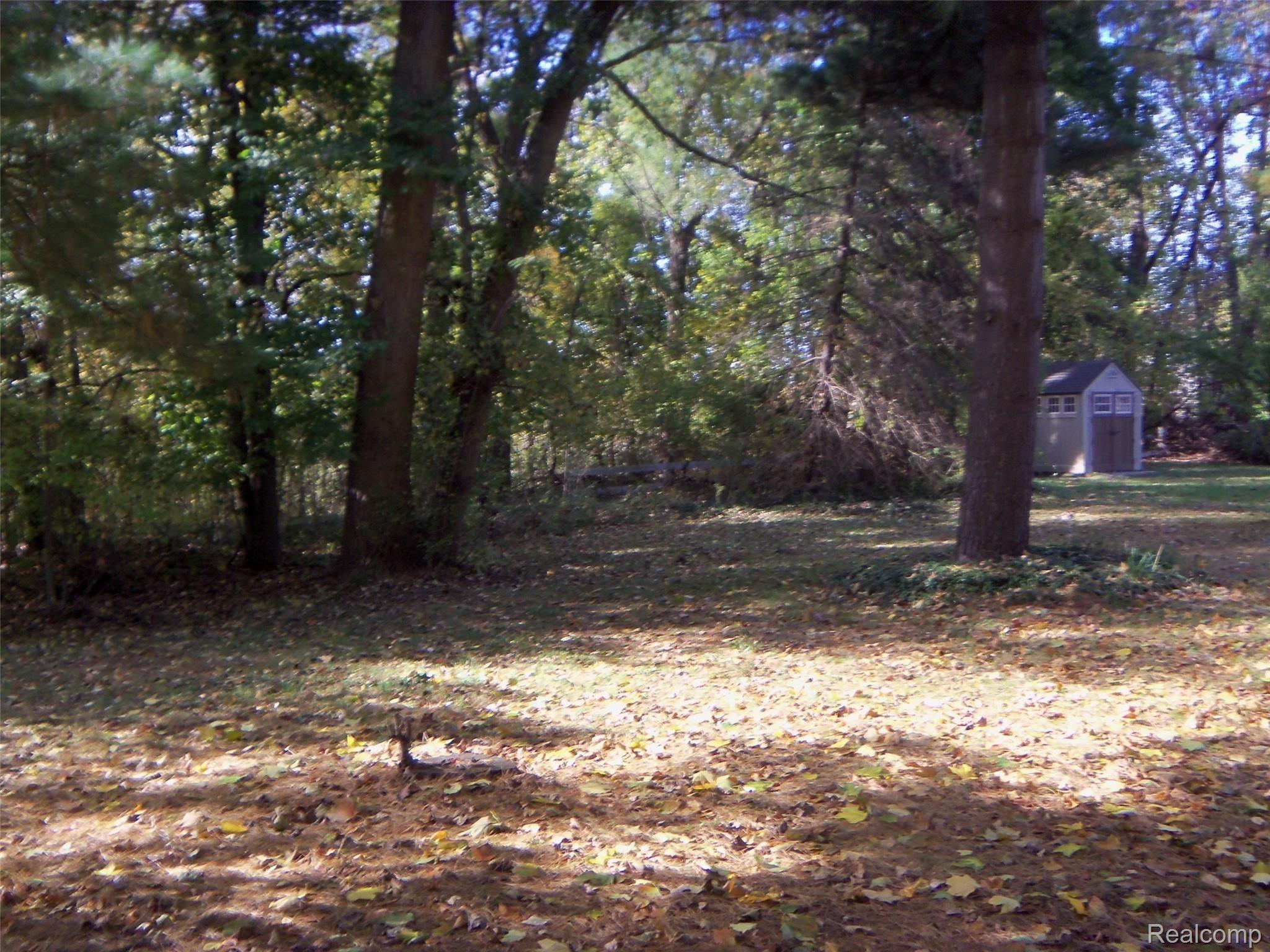 1451 Glen Road Howell, MI 48843 - Photo 18 of 21 Large back yard/woods