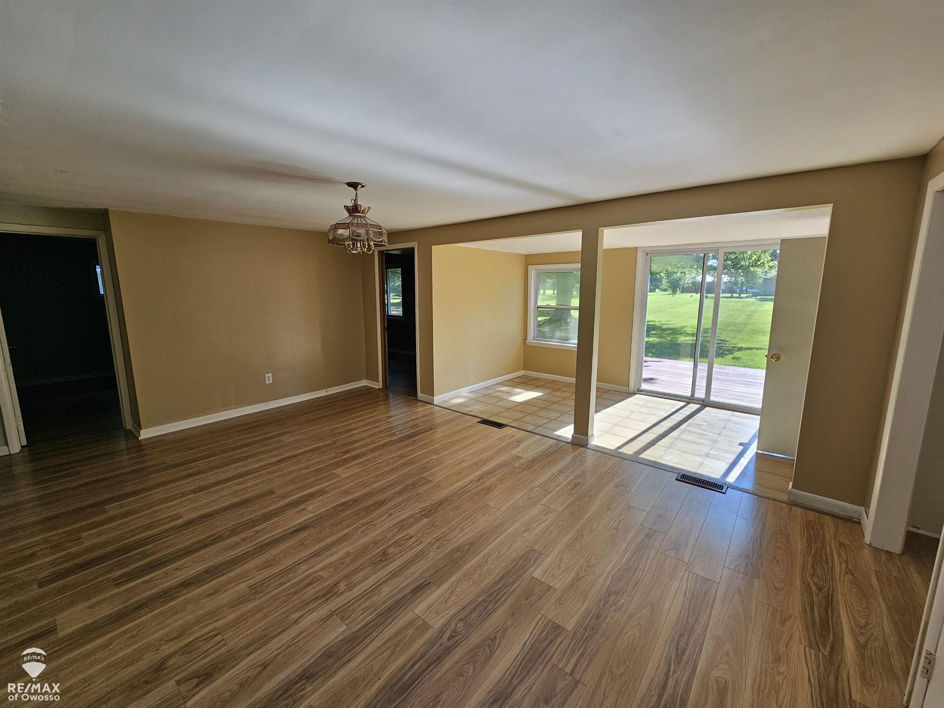 1516 North Hickory Road Owosso, MI 48867 - Photo 8 of 26 Room behind Kitchen and next to garage.