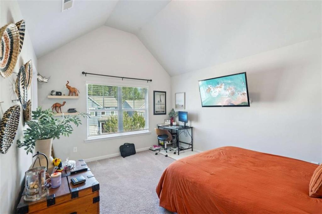 3605 Broadwick Lane Lithonia, GA 30038 - Photo 14 of 41 a bedroom with furniture and a window