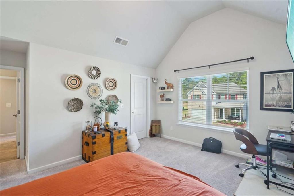 3605 Broadwick Lane Lithonia, GA 30038 - Photo 15 of 41 a bedroom with a bed and a window